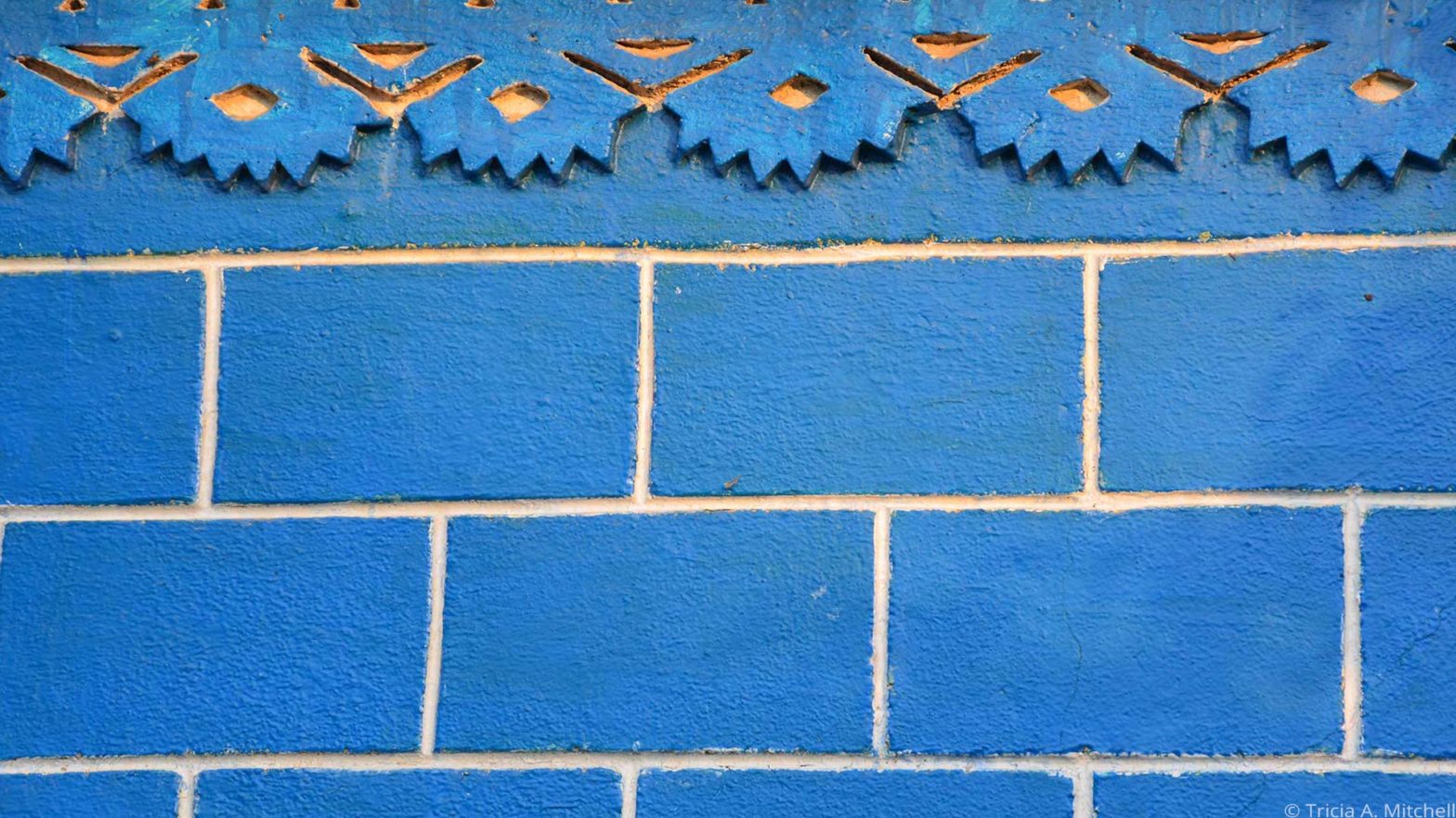 Blue bricks perfectly aligned.